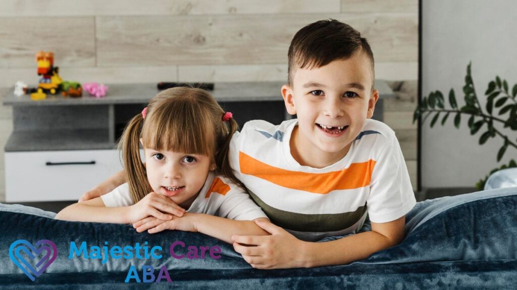 Autistic child and sibling working together with mutual support.